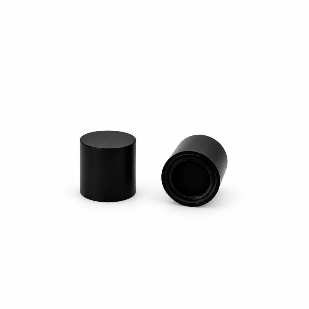 Model 7406 matte black cylindrical perfume bottle caps, showing exterior and interior views.