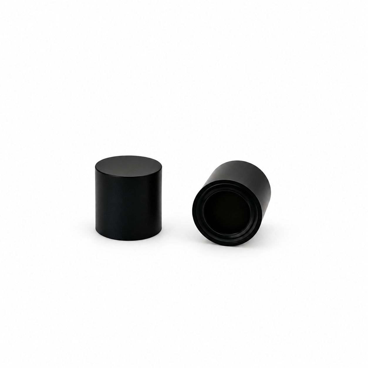 Model 7406 matte black cylindrical perfume bottle caps, showing exterior and interior views.