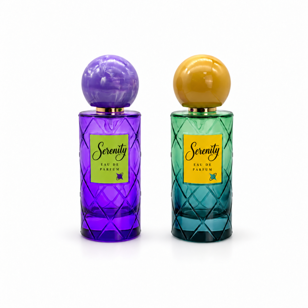 Two 100ml cylindrical glass perfume bottles with a diamond lattice pattern, spherical caps and rectangular front labels.