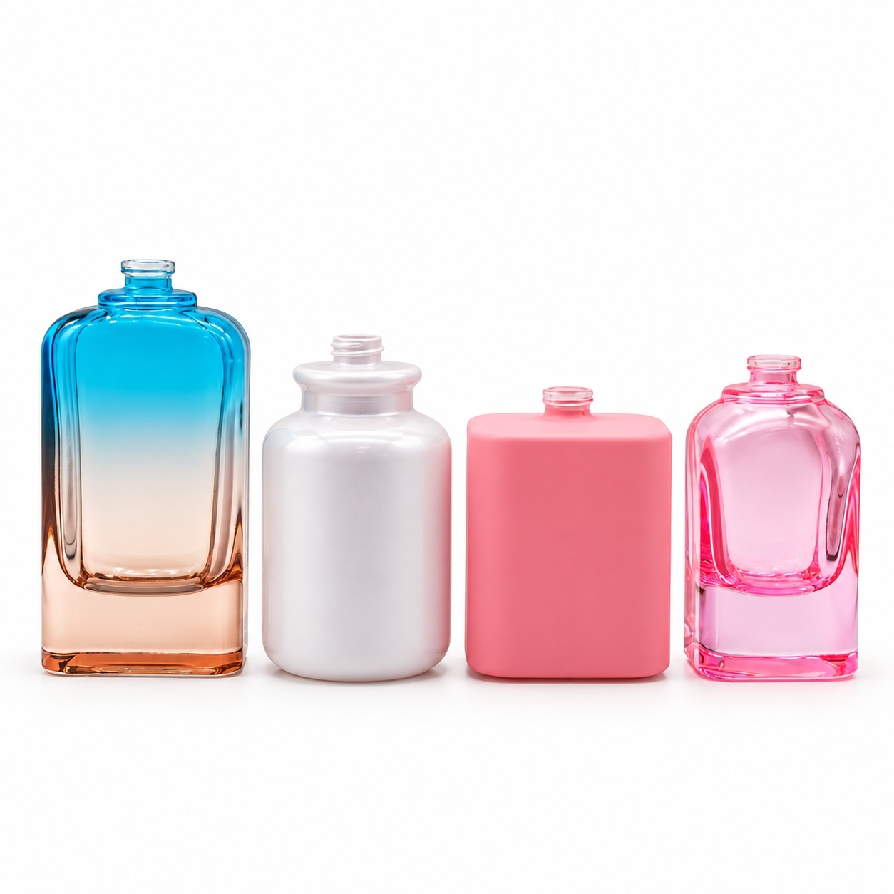 Four spray-coated glass perfume bottles with gradient blue and amber, pearlescent white, matte pink and translucent pink finishes