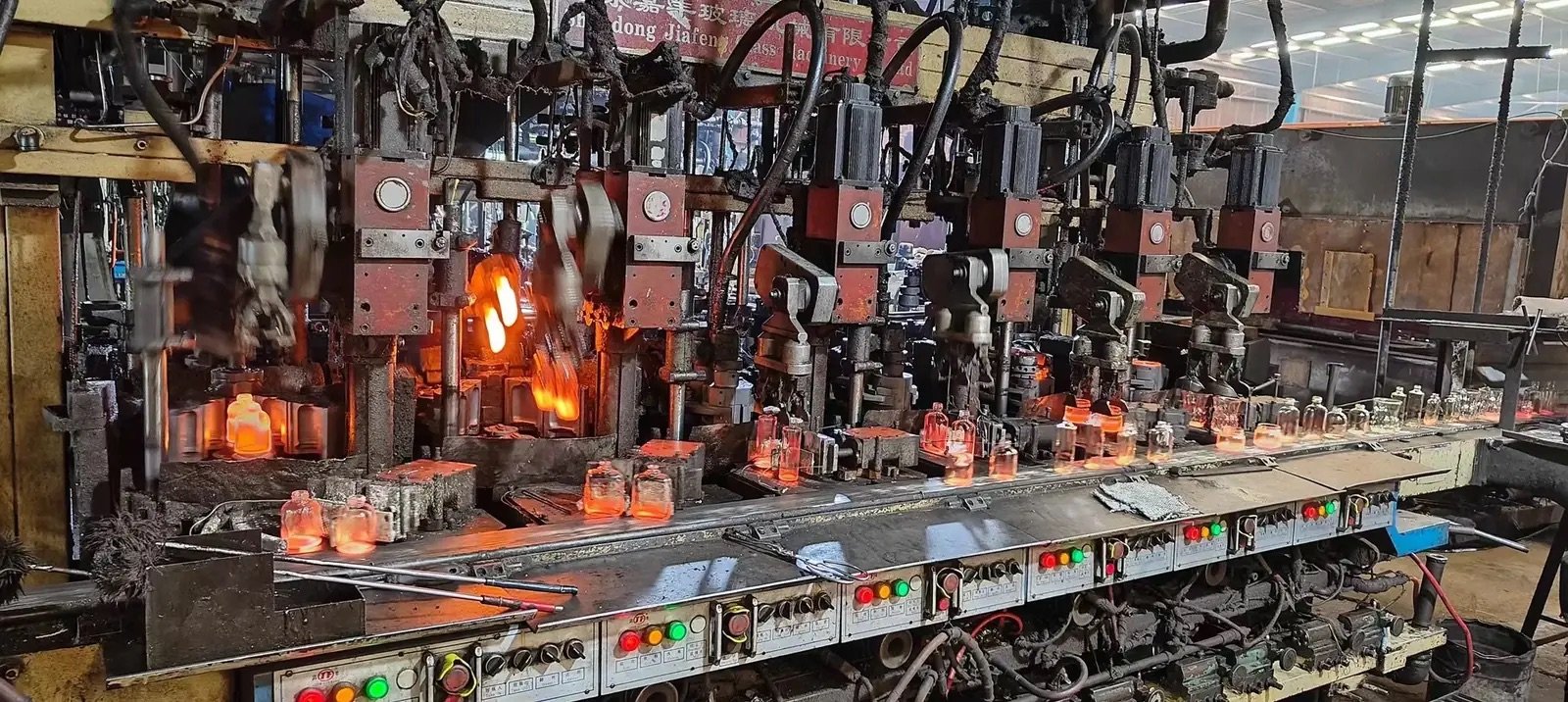 Glass bottle forming equipment on the factory production line